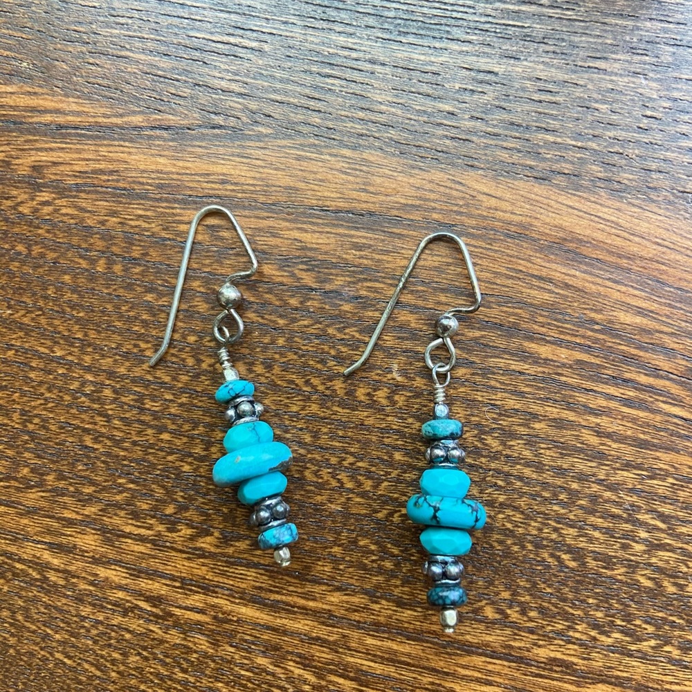 Teal stacked dangly earrings